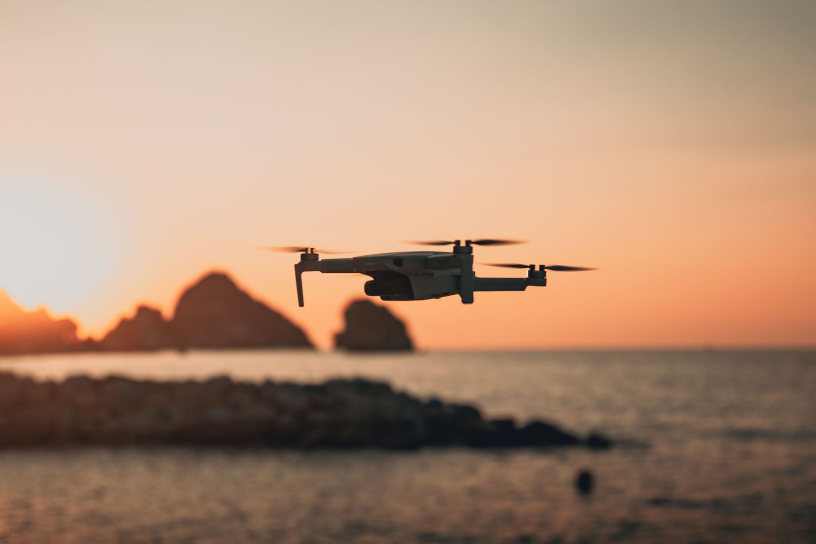 Drone over the coast at sunset